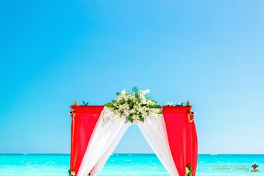 Beach red wedding ceremony decor
