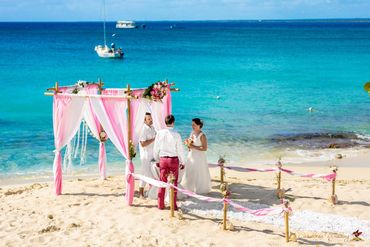 Beach pink wedding ceremony decor