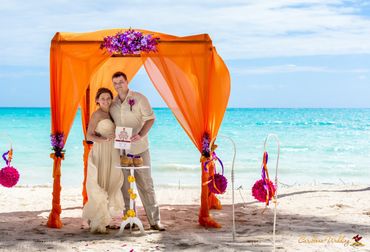 Beach orange wedding ceremony decor
