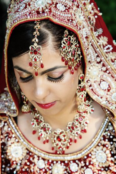 Themed red bridal hair and make-up