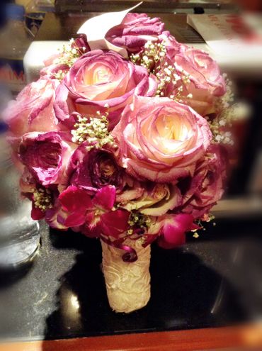 Purple rose wedding bouquet