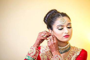 Ethnical red bridal hair and make-up