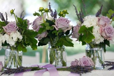 Outdoor purple wedding floral decor