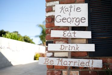 Outdoor white wedding signs
