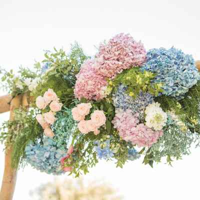 Outdoor blue wedding floral decor