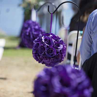 Outdoor purple wedding ceremony decor