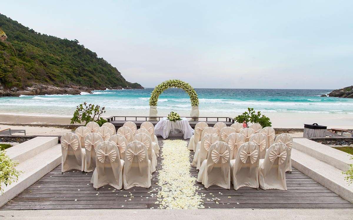 Ivory beach wedding ceremony decor