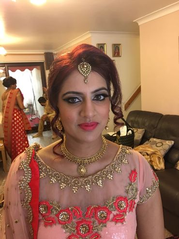 Pink ethnical bridal hair and make-up