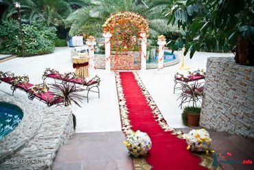 Orange wedding ceremony decor