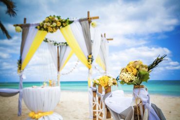 Beach yellow wedding ceremony decor